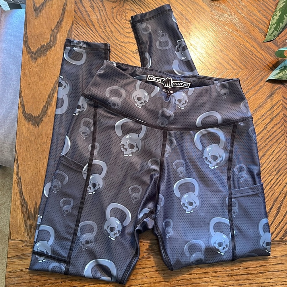 Feed me fight me kettle bell skull leggings